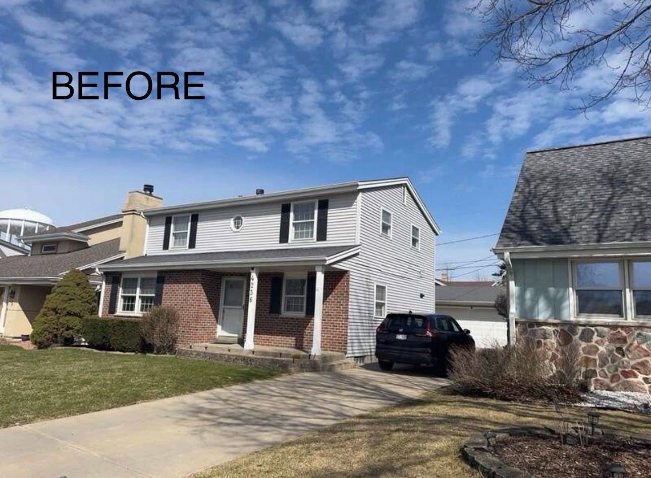 Home with old tan siding before Ironhorse Exteriors